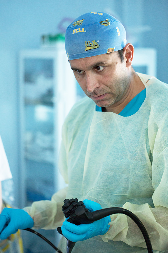 Gastroenterologist Dr. Edgar Mehdikhani performing a colonoscopy and training local clinicians at the hospital