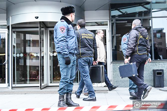 Armenia's national police officers respond to a shooting at Erebuni Plaza in Yerevan on Jan. 23