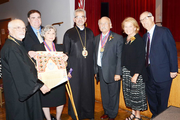 Khajag Sarkissian (third from right) was the first recipient of the Western Prelacy's Leadership medal in 2014