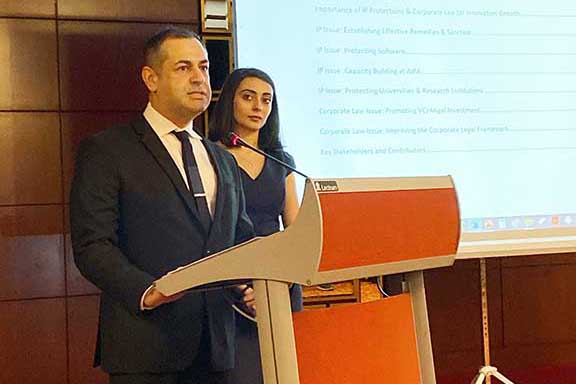 The author, Ara Babaian, speaks at the IP & Corporate Law Summit