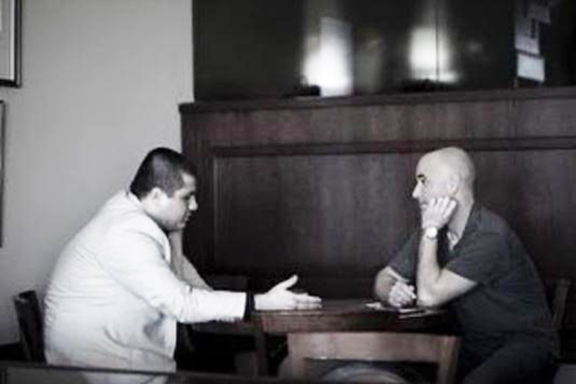 Akopyan interviewing Hall of Fame tennis player Andre Agassi