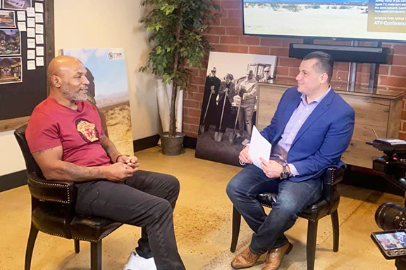 Akopyan interviewing American professional boxer Mike Tyson