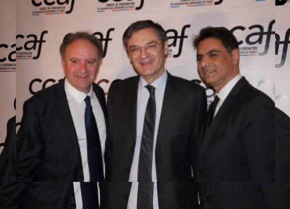 Patrick Devedjian (center) with Mourad Papazian (right) and Ara Toranian, the co-chairman of the CCAF, during the organization's gala in January 2020