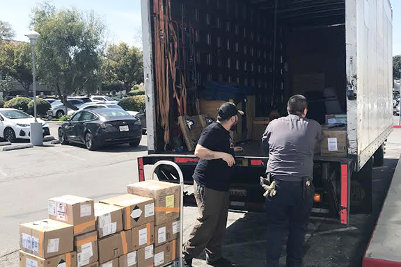 Boxes of critical supplies necessary for screening and isolation being loaded on its way to LAX air cargo for a speedy arrival to Armenia