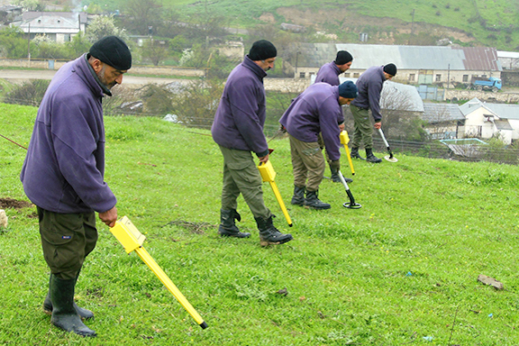 HALO Trust staffers are seen here clearing mines in Nerkin Horatagh in Artsakh in 2016 (HALO Trust photo)