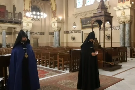 With the pews empty, Armenian religious leaders performed Palm Sunday Mass, which was broadcast on Facebook Live
