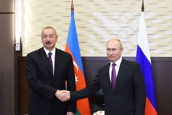 President Ilham Aliyev of Azerbaijan (left) with his Russian counterpart Vladimir Putin in Moscow in 2018