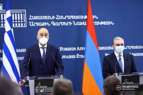 Greece's Foreign Minister Nikos Denidas at a joint press conference in Yerevan with his Armenian counterpart Zohrab Mnatsakanyan on Oct. 16