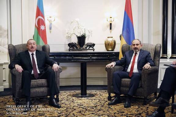 Prime Minister Nikol Pashinyan (right) with Azerbaijan's Ilham Aliyev during an earlier summit meeting on Karabakh