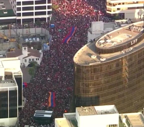 The 150,000-strong crowd marches along Wilshire Boulevard in Beverly Hills
