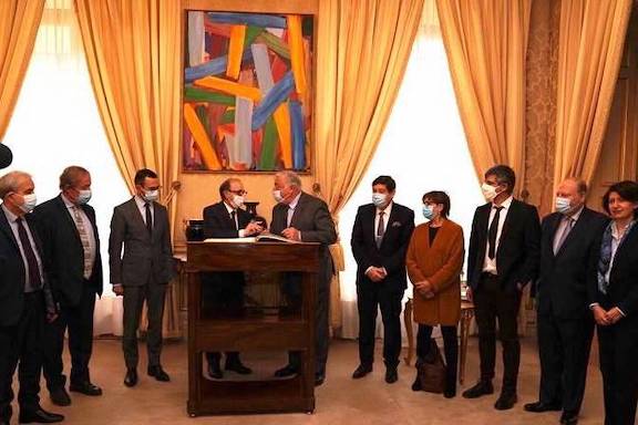 Armenia's Foreign Minister Ara Aivazyan (center left) with the French Senate president Gérard Larcher on Dec. 9 in Paris